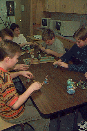 grade 6 students working on art