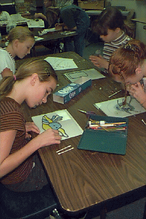 Grade 6 girls working on glass painting